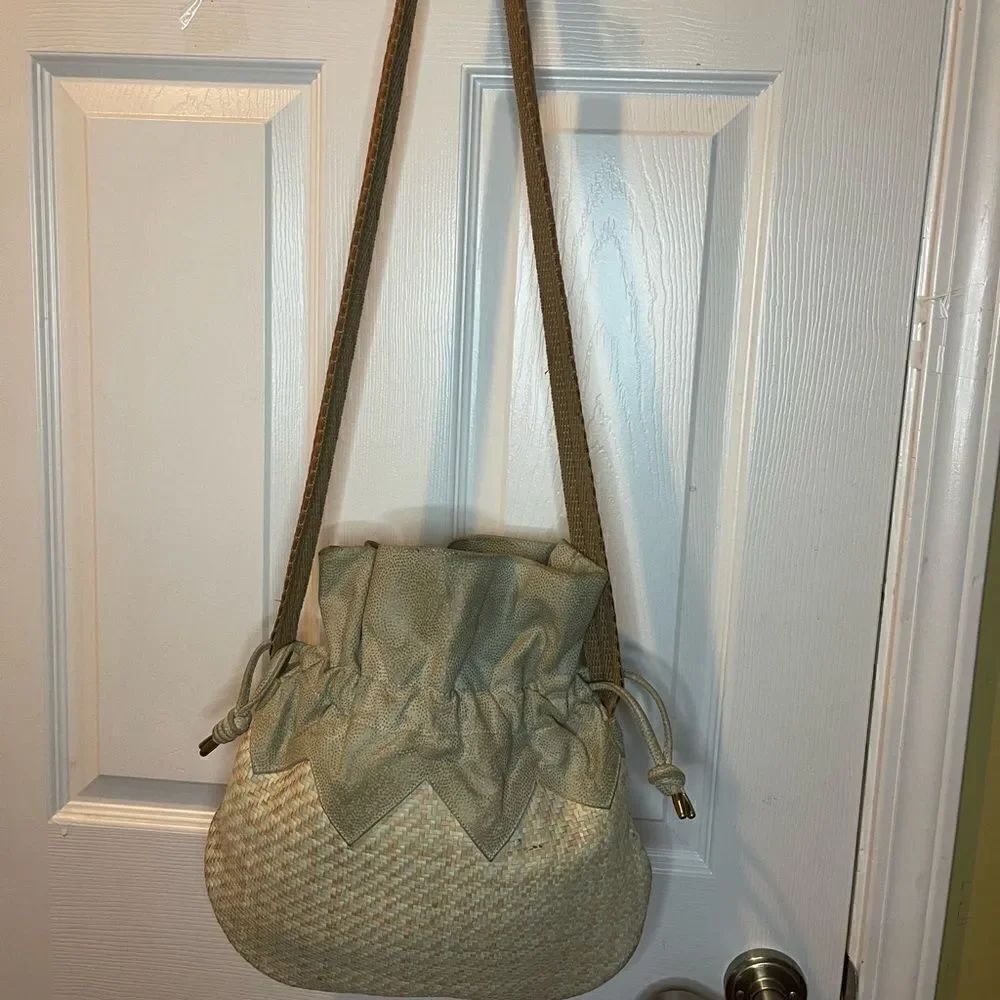 Sondra Roberts leather woven green &tan bucket style draw string shoulder bag